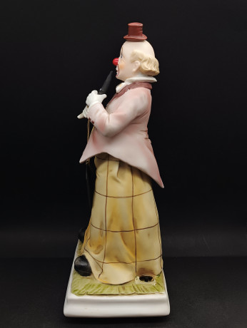 Музыкальная шкатулка винтажная Melody in Motion "Клон с флейтой", ручная роспись, бисквитный фарфор, 32 см, Германия, 1970-80гг.