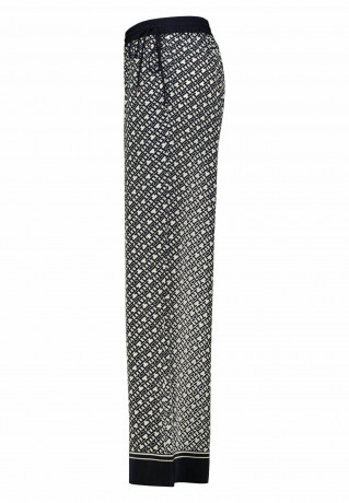 Tommy Hilfiger TH MONOGRAMM Trousers stein TH MONOGRAM Брюки камень