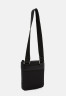 Tommy Hilfiger TH CENTRAL RPREVE MINI CROSSOVER Across body bag black TH CENTRAL RPREVE MINI CROSSOVER Сумка через плечо черный