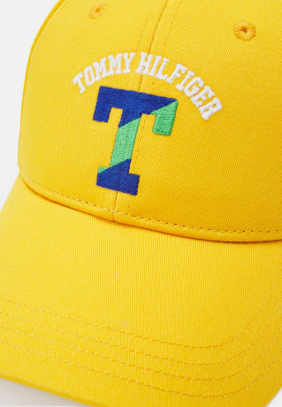 Tommy Hilfiger COLORFUL VARSITY UNISEX Cap college gold ЦВЕТНАЯ УНИВЕРСИТЕТСКАЯ УНИСЕКС Кепка золото колледжа