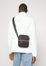 Tommy Hilfiger 1985 MINI REPORTER UNISEX Across body bag black 1985 MINI REPORTER UNISEX — Сумка через плечо черный